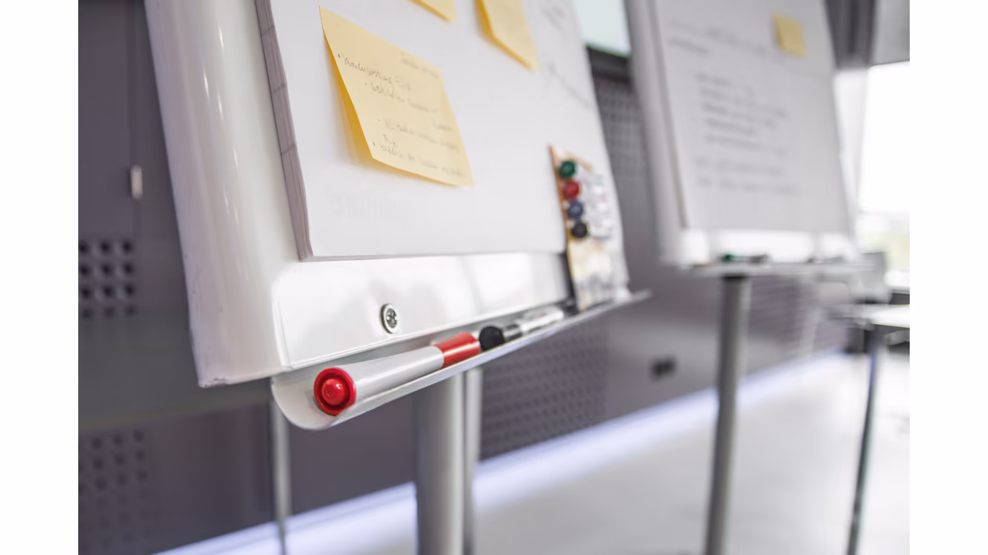 A whiteboard covered in workshop notes