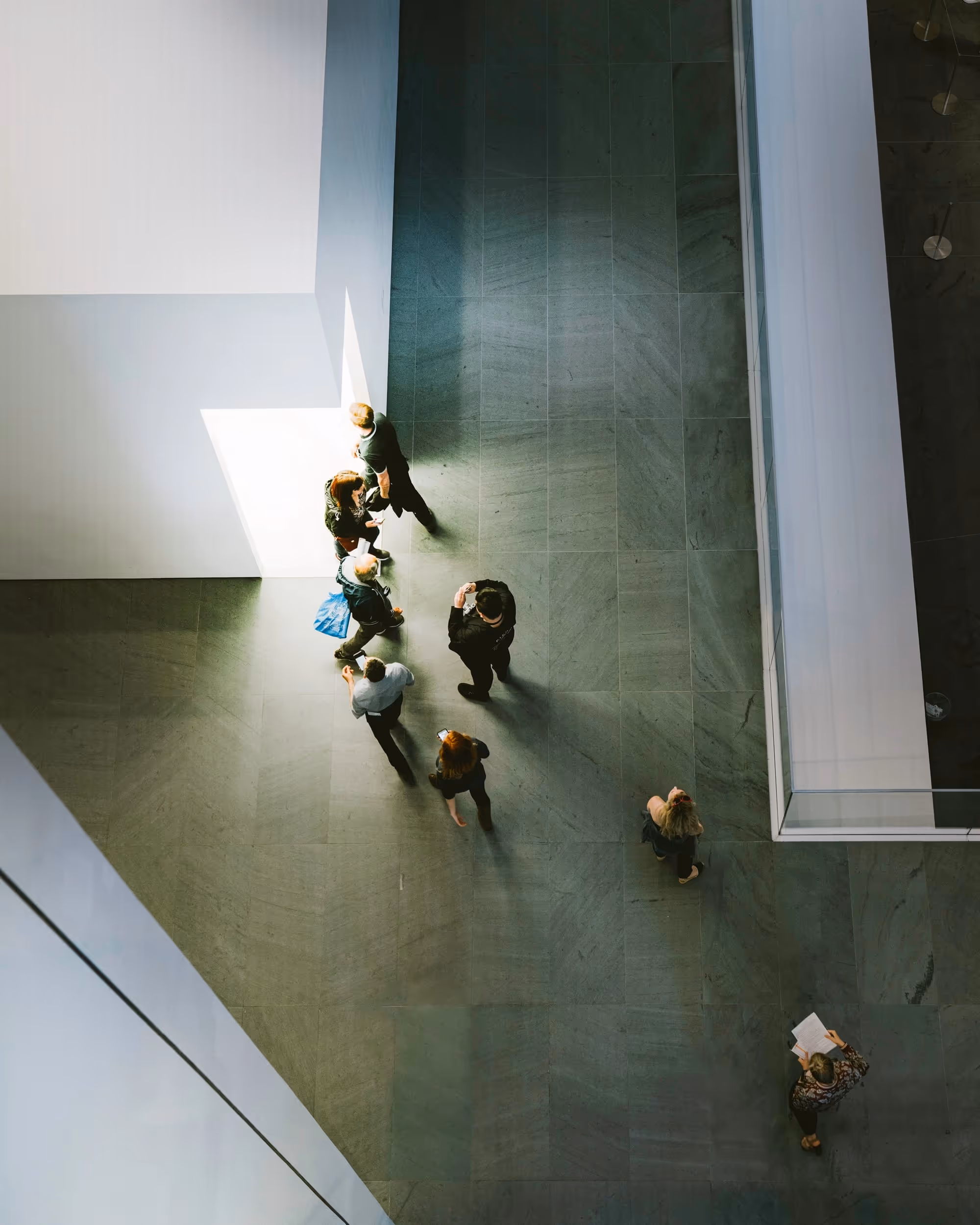 A long, light-filled office corridor